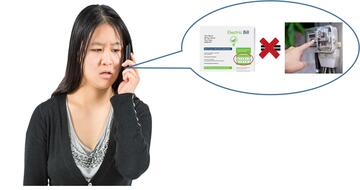 A lady talking on the phone.  In the speech bubble is a bill, an equals sign with a red cross through it and a finger pointing to a meter.
