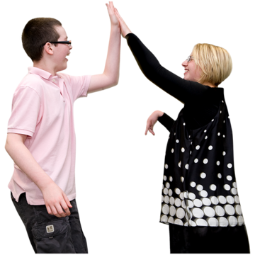 A  young man and a young woman with learning disabilities high five each other