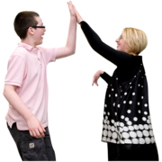 A  young man and a young woman with learning disabilities high five each other