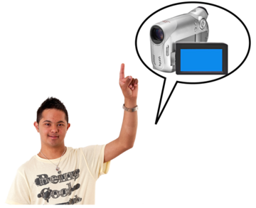 A young man with his hand raised asking about a video recording