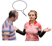 A woman with her arms open explaining something to a man