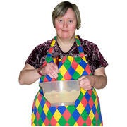 A lady wearing an apron and holding a spoon and a mixing bowl.