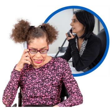 A woman is phoning someone who is sitting at a desk