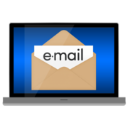 A laptop screen showing an envelope and the word email