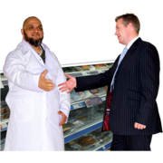 Two men shake hands in a super market.