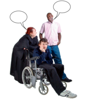 A  man in a wheelchair looks fed up because the two people who are with him are not talking to him