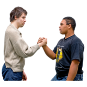 Two men shake hands and talk to each other
