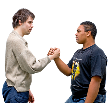 Two men facing each other with their hands together