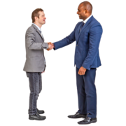 Two men in suits shake hands.