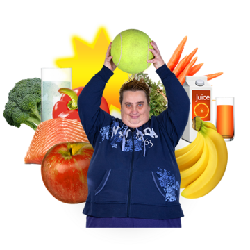 A woman with a ball above her head standing in front of healthy foods