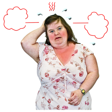 A woman looking very red in the face holding her head. Next to her head are symbols of steam and heat