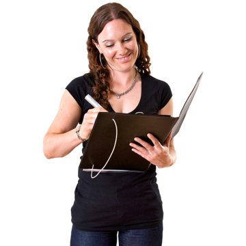 A woman is standing up, writing with a pen in a file and smiling