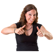 A woman with both her thumbs up smiling
