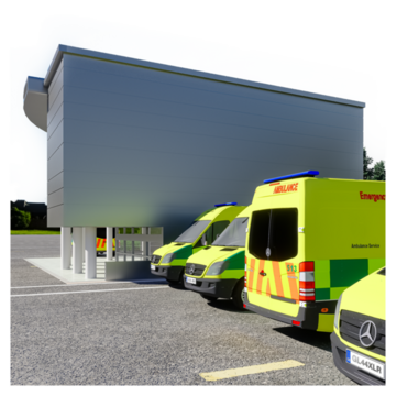 a picture of a big medical building with ambulances in the car park