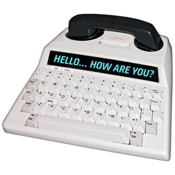 A phone which shows a text message on a display above the keys