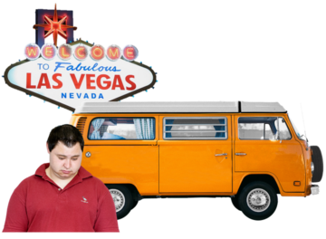 A man looking sad in front of a yellow camper van and the Welcome to Las Vegas street sign