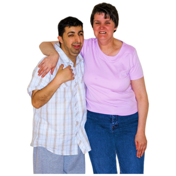 A man with learning disabilities next to a woman who has her arm around his shoulders