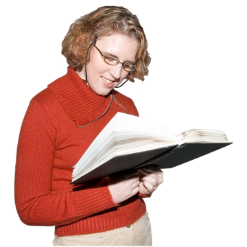 A woman reading from a book.