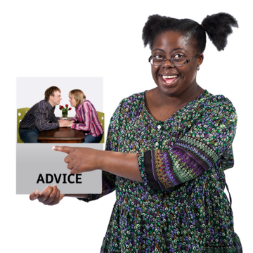 A woman holding up a booklet about relationship advice