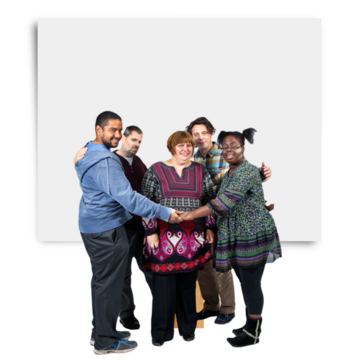 A group of people with their arms around each other in front of a blank poster