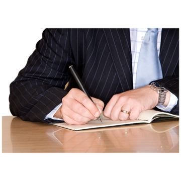 A person writing at a desk