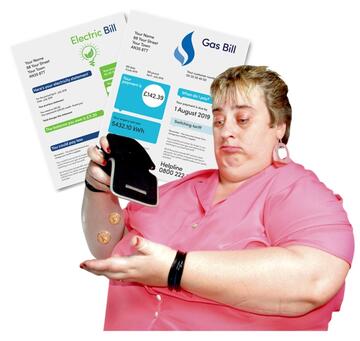 A lady holding her wallet upside down with a few pennies falling out.  Behind her are a gas and an electric bill.