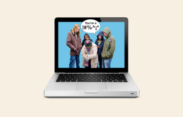 A laptop screen showing a picture of an old woman being bullied by a group of young people
