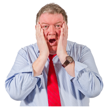 A man with his hands on his face looking shocked