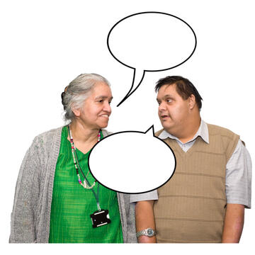 2 people talking to each other.