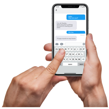 Two hands are using a mobile phone to text someone