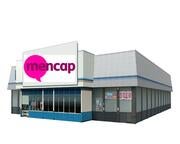 A shop with the Mencap logo on its sign