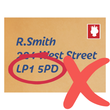 A handwritten addressed envelope with a red cross next to it