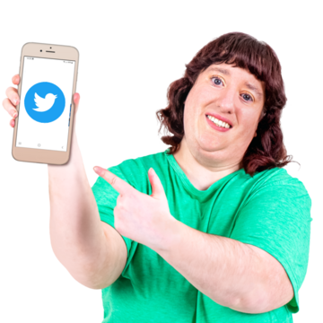 A woman holding up a mobile phone with the Twitter logo on the screen