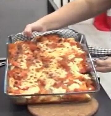 A dish of cooked enchiladas.