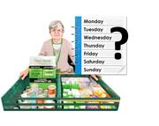 A lady standing behind 2 trays of long life food.  Beside her are the days of the week and a question mark.