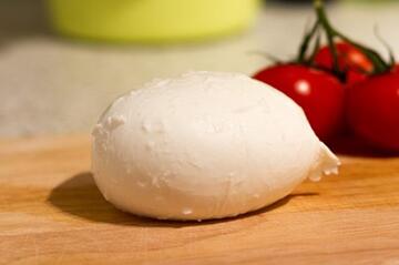 A ball of mozzarella cheese.