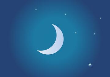 A night sky with a moon and stars.