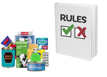 A rule book beside some tins of food.