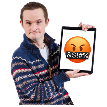 A man holds up a tablet which has a swearing emoji on it.