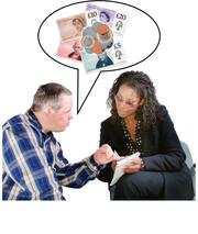 A man sitting down and talking to a lady.  Above the man is a speech bubble with money inside.