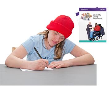 A lady filling in a form with the words DLA beside her.