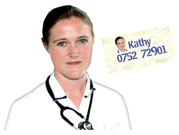 A lady wearing a stethoscope and a card with her picture and phone number on it.