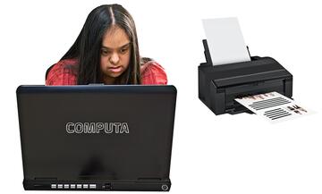 A woman typing on a laptop and a printer with some paper in it.