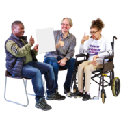 Three people are sitting together and one person is holding a leaflet. All three have their thumbs up