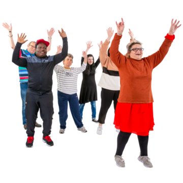 A group of people dancing and waving their hands in the air