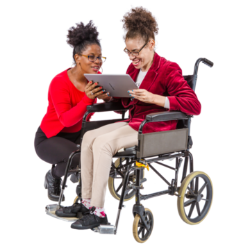 A woman in a wheelchair is being shown a tablet by a support worker who is kneeling down next to her