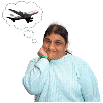 A woman is resting her hand on her chin thinking about flying off on holiday
