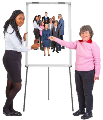 Two women are standing either side of a flip chart and pointing to the picture on it. The picture is a group of senior managers