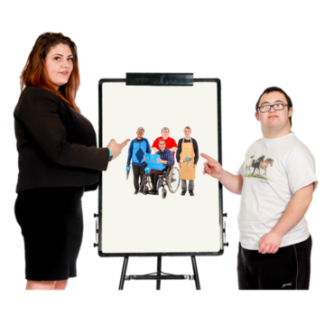 A man with downs syndrome and a woman are pointing to a flip chart which has a picture of people with learning disabilities doing different jobs