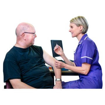 A man sitting next to a nurse who is about to give him an injection in the arm